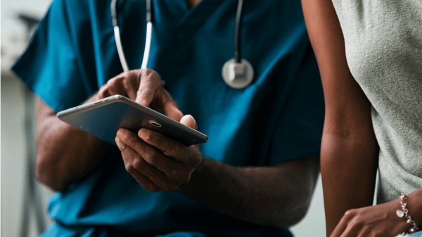 doctor with ipad